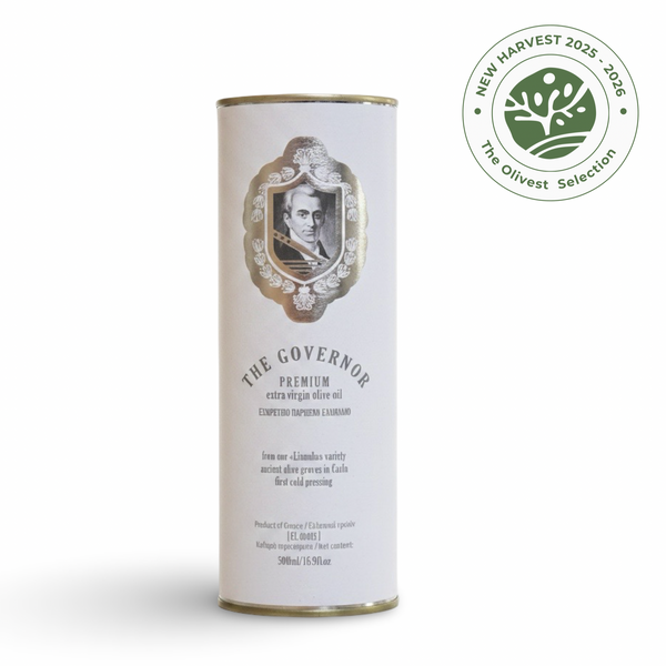 A tall cylindrical white tin of The Governor Premium Extra Virgin Olive Oil on a white background, featuring a gold crest and a green circular 'New Harvest 2025 - 2026 The Olivest Selection' badge in the top right.